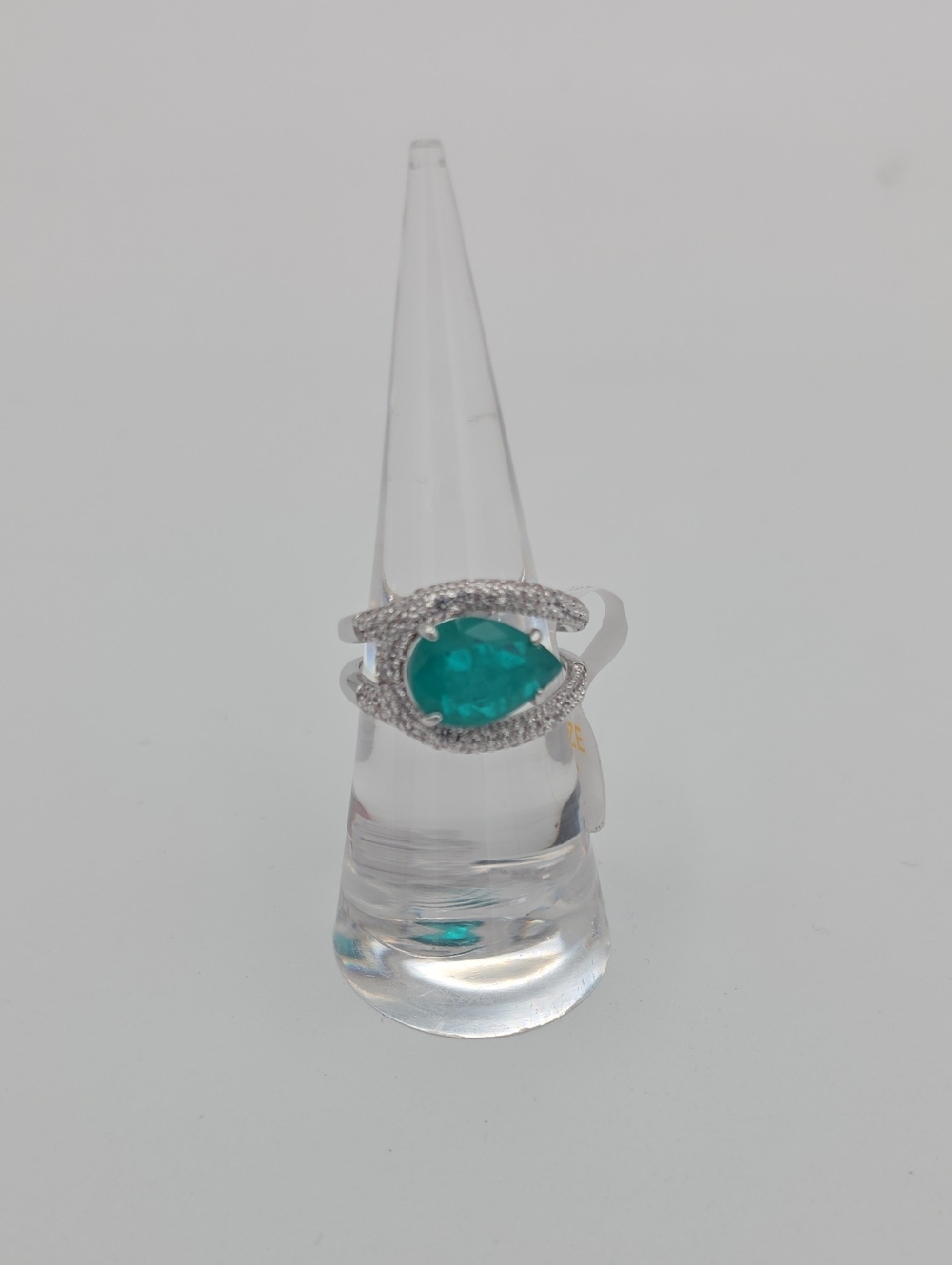 Teardrop Emerald Green Halo Ring in Rhodium